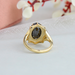 10k, 14k, and 18k yellow gol black oval gemstone solitaire ring