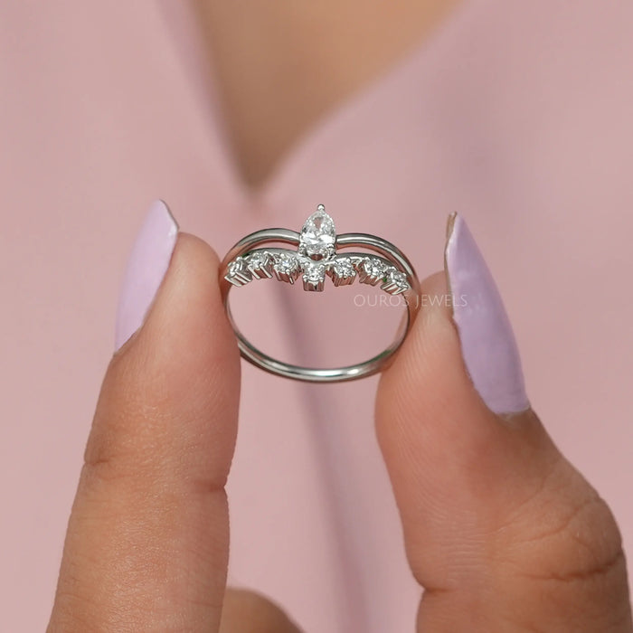 Framed from 14k White gold and  stunning pear shaped lab created diamond ring.