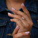 [On Finger Side View Of 1 Carat Fancy Pink Diamond With Round Diamond Halo Engagement Ring]-[Ouros Jewels]