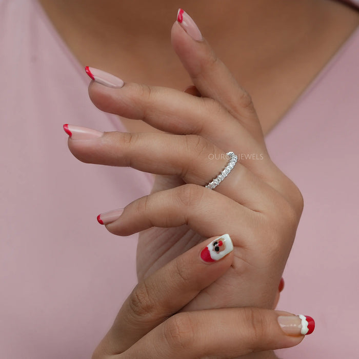 In finger side look of princess shaped lab made diamond wedding anniversary ring