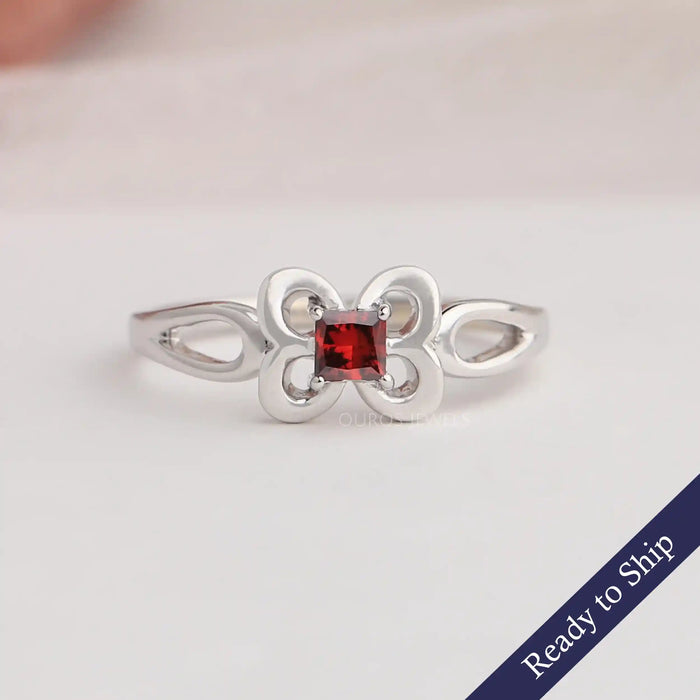 Red princess cut lab grown diamond engagement ring in butterfly shape with 14k white gold