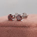 Shining fancy colored solitaire diamond earrings in solid white gold 